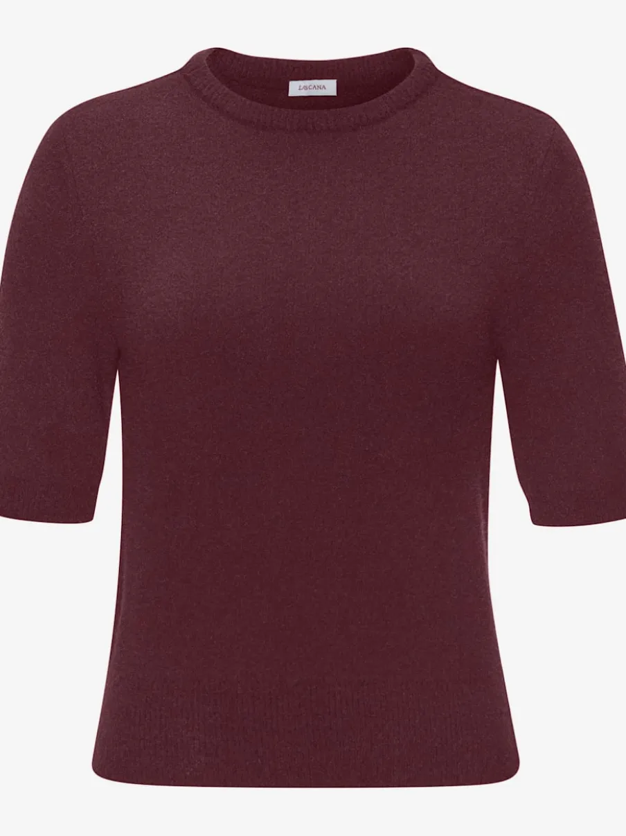 Pull à manches courtes avec encolure ronde et ourlet côtelé