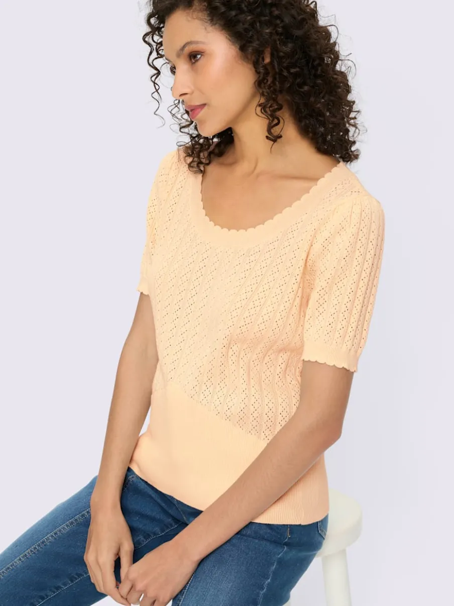 Pull à manches courtes avec motif ajouré et bord ondulé