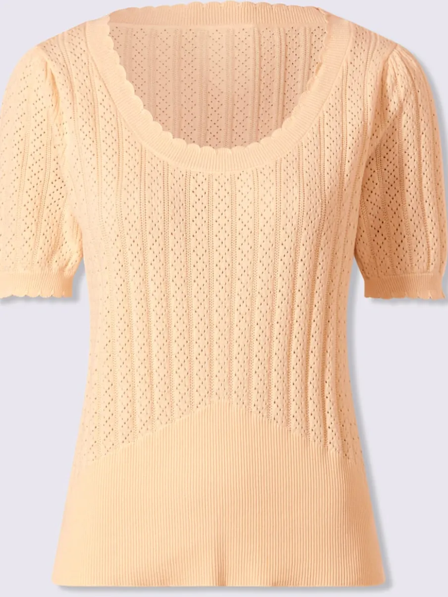 Pull à manches courtes avec motif ajouré et bord ondulé