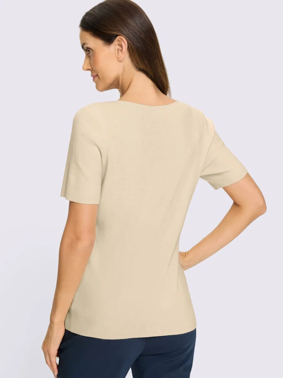 Pull à manches courtes encolure en forme de cœur