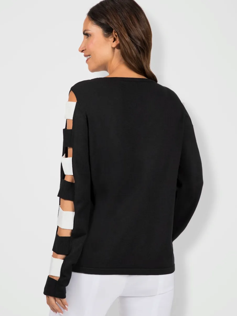 Pull à manches longues avec découpes encolure en V
