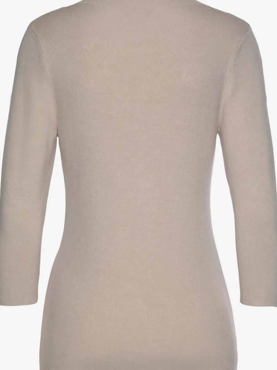 Pull près du corps à encolure haute et manches 3/4