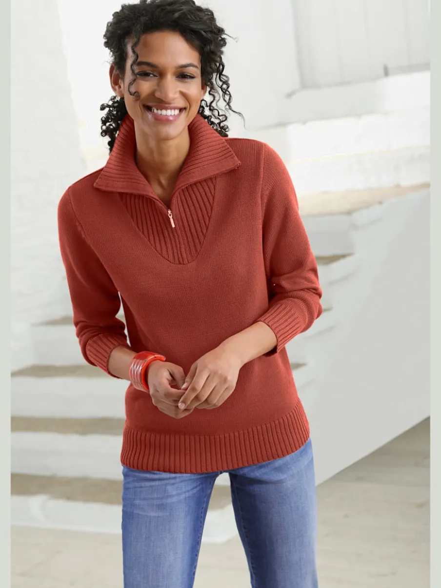 Pull sport avec col montant et manches longues côtelées