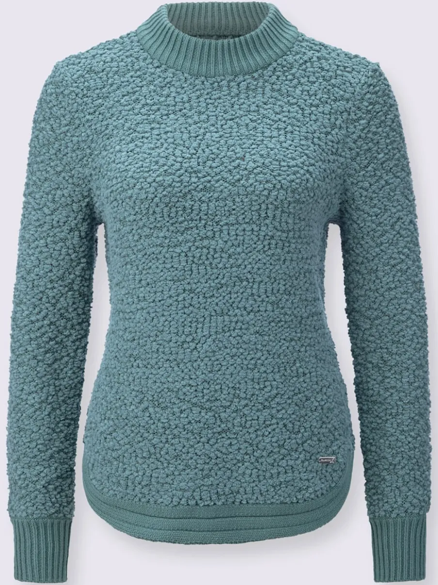 Pull tricoté doux avec col montant et finitions côtelées