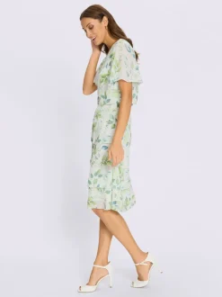 Robe avec motif feuilles manches chauve-souris et volants