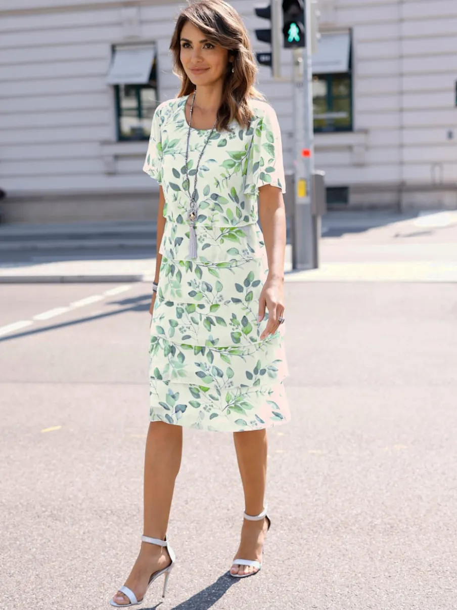 Robe avec motif feuilles manches chauve-souris et volants