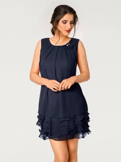 Robe de cocktail à encolure ronde et sans manches avec volants
