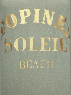 Robe de plage encolure avec bords-côtes légèrement brillants grâce au fil lurex