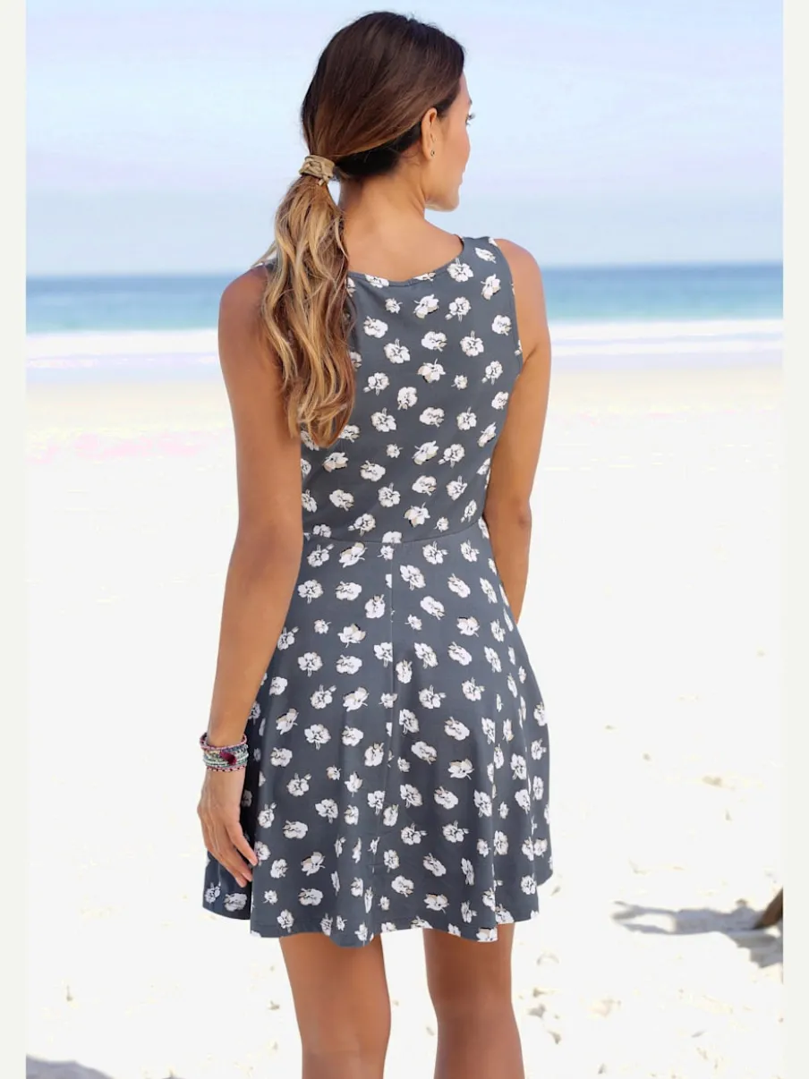 Robe de plage à jupe évasée et motifs fleuris