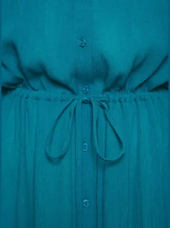 Robe de plage robe-chemisier tendance