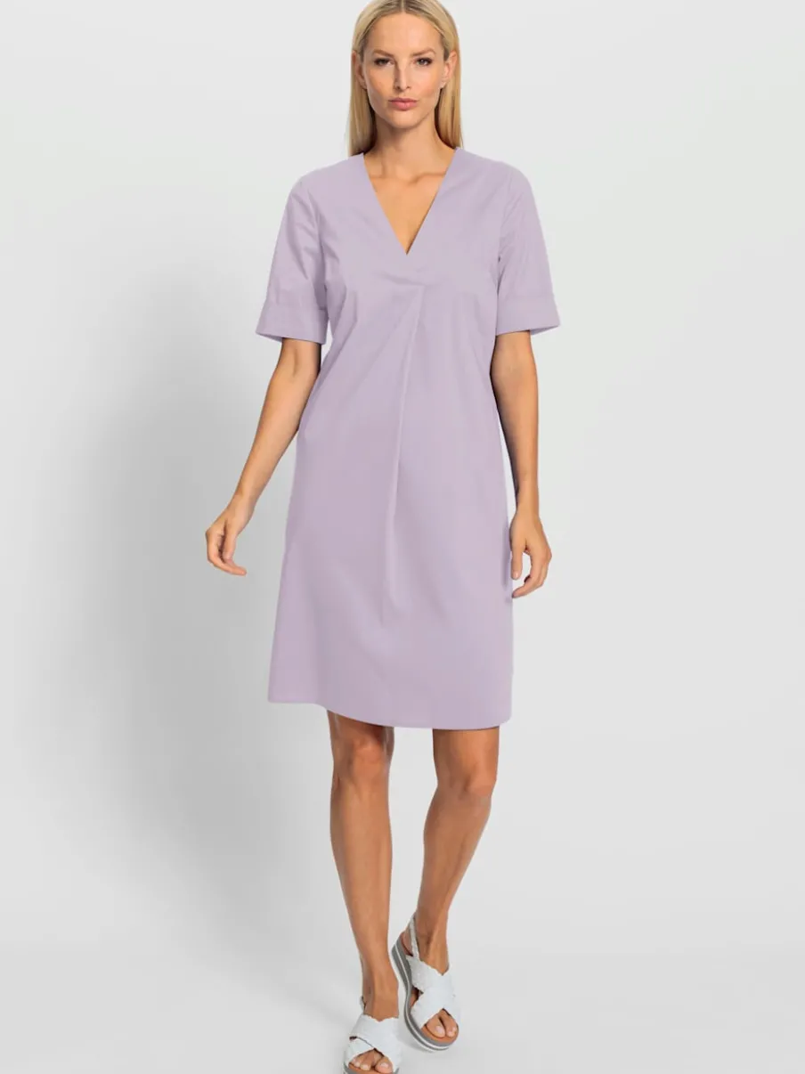 Robe d'été avec encolure en V et poches latérales