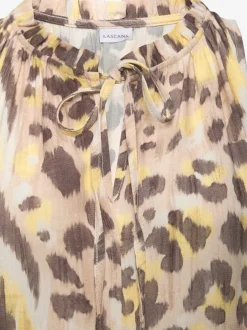 Robe d'été sans manches avec encolure à volants et jupe évasée à volants