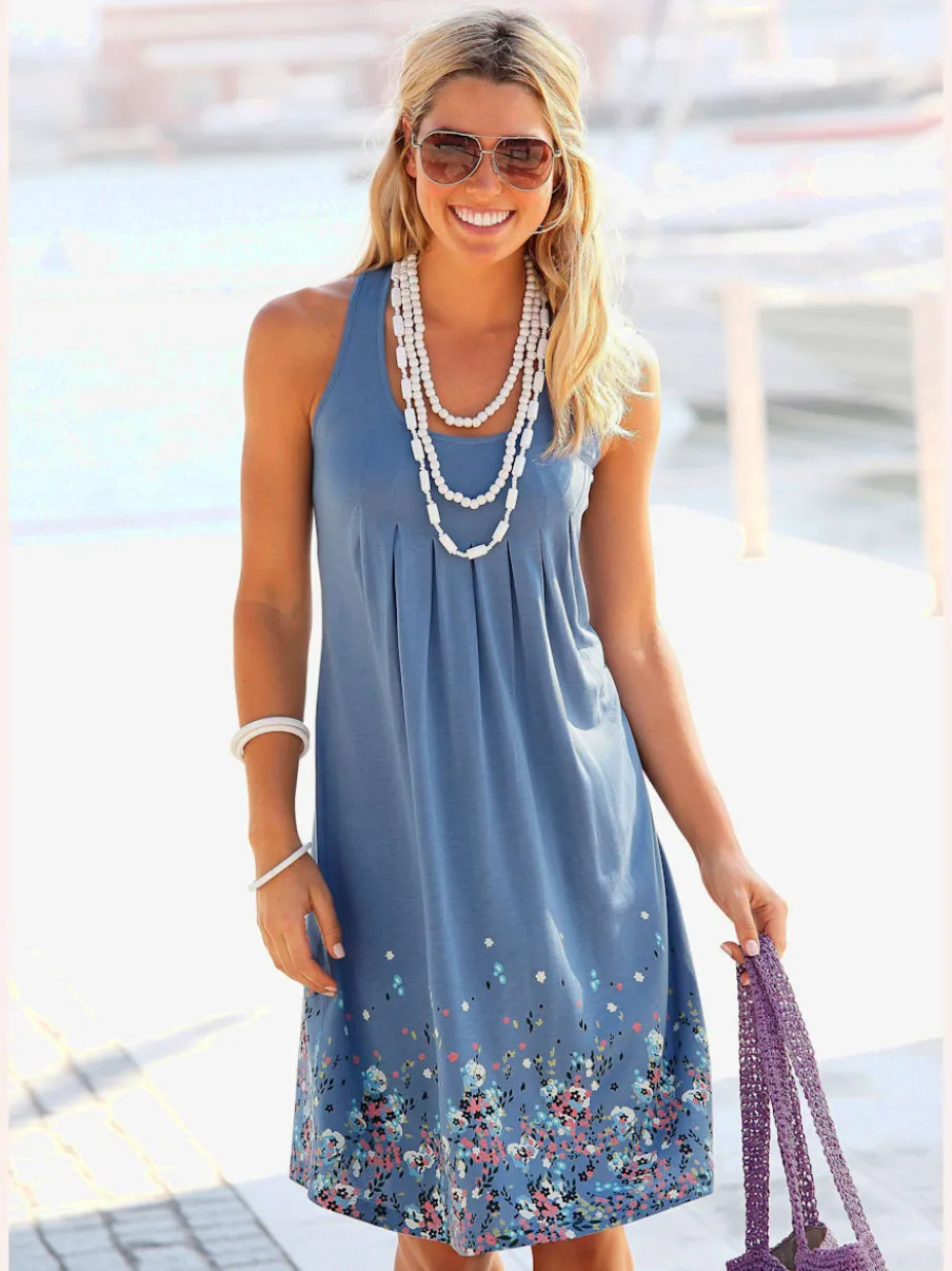 Robe d'été sans manches à motifs floraux avec détails plissés
