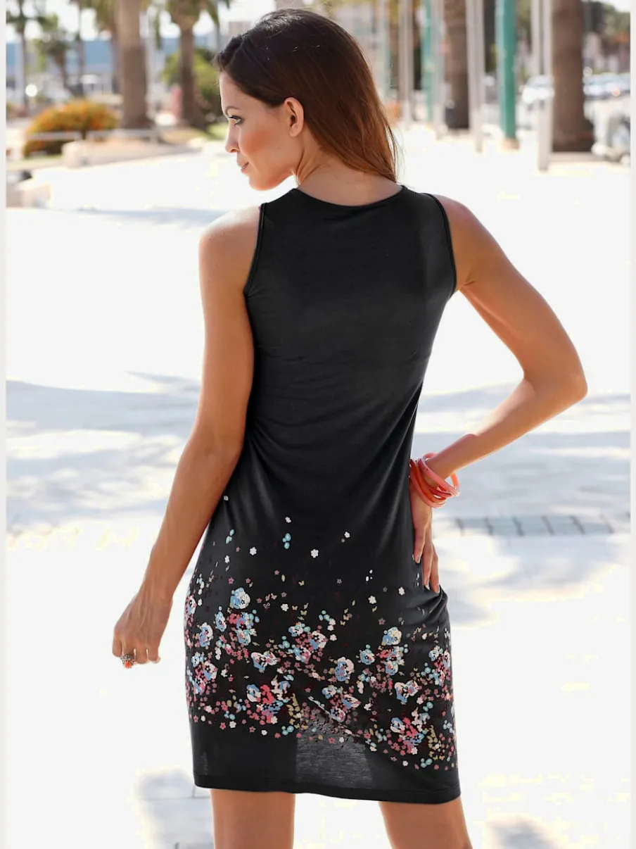 Robe d'été sans manches à motifs floraux avec détails plissés