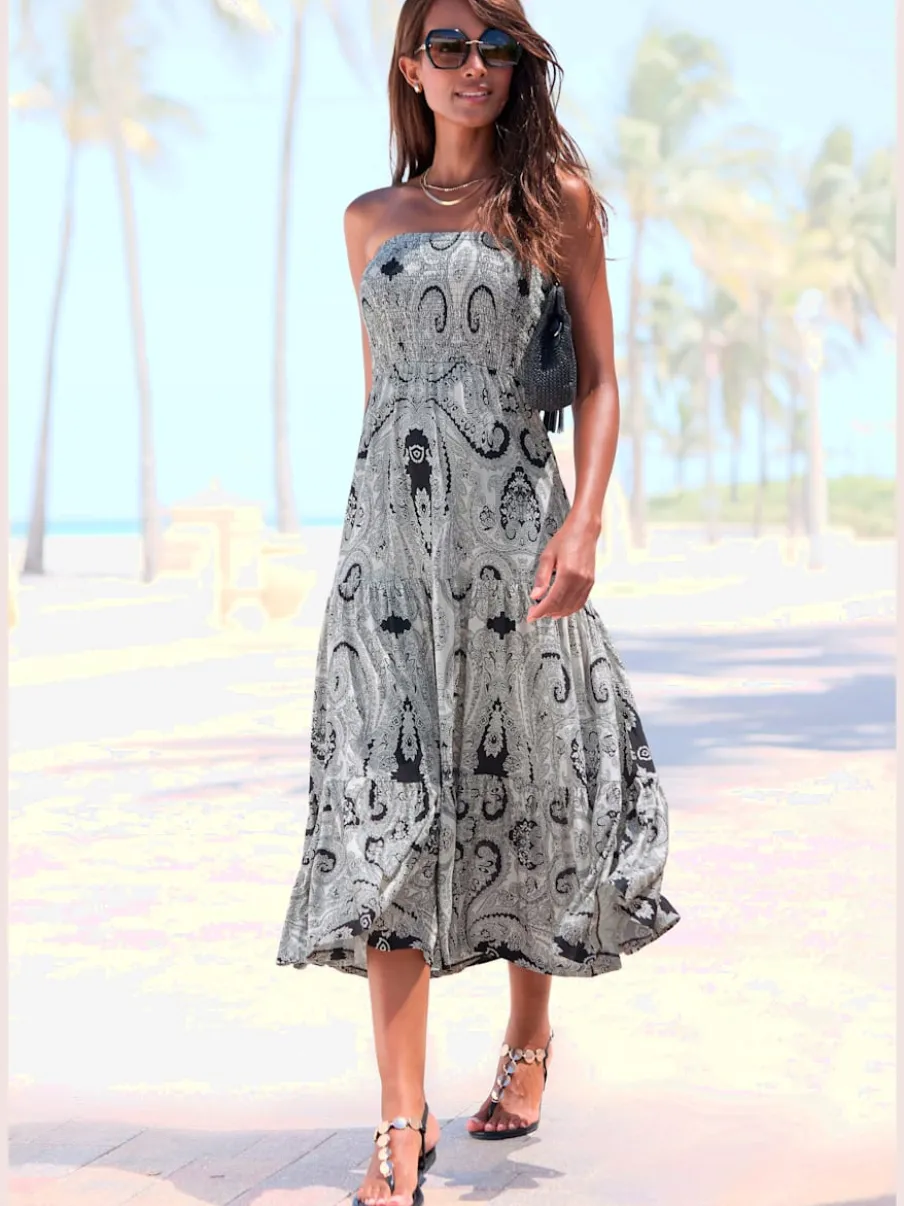 Robe 2 en 1 avec ceinture smockée et jupe volants