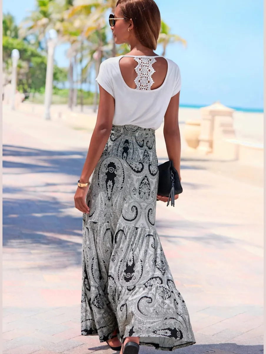 Robe 2 en 1 avec ceinture smockée et jupe volants