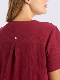 Robe en coton col v avec patte de boutonnage