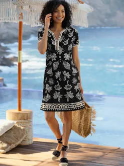 Robe en jersey avec col V et manches courtes à imprimé palmier