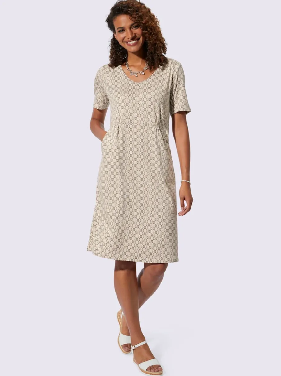 Robe en jersey avec encolure en V et poches