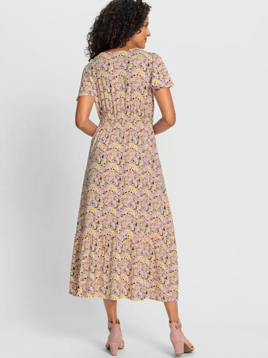 Robe en jersey avec fleurs et col en V à manches chauve-souris