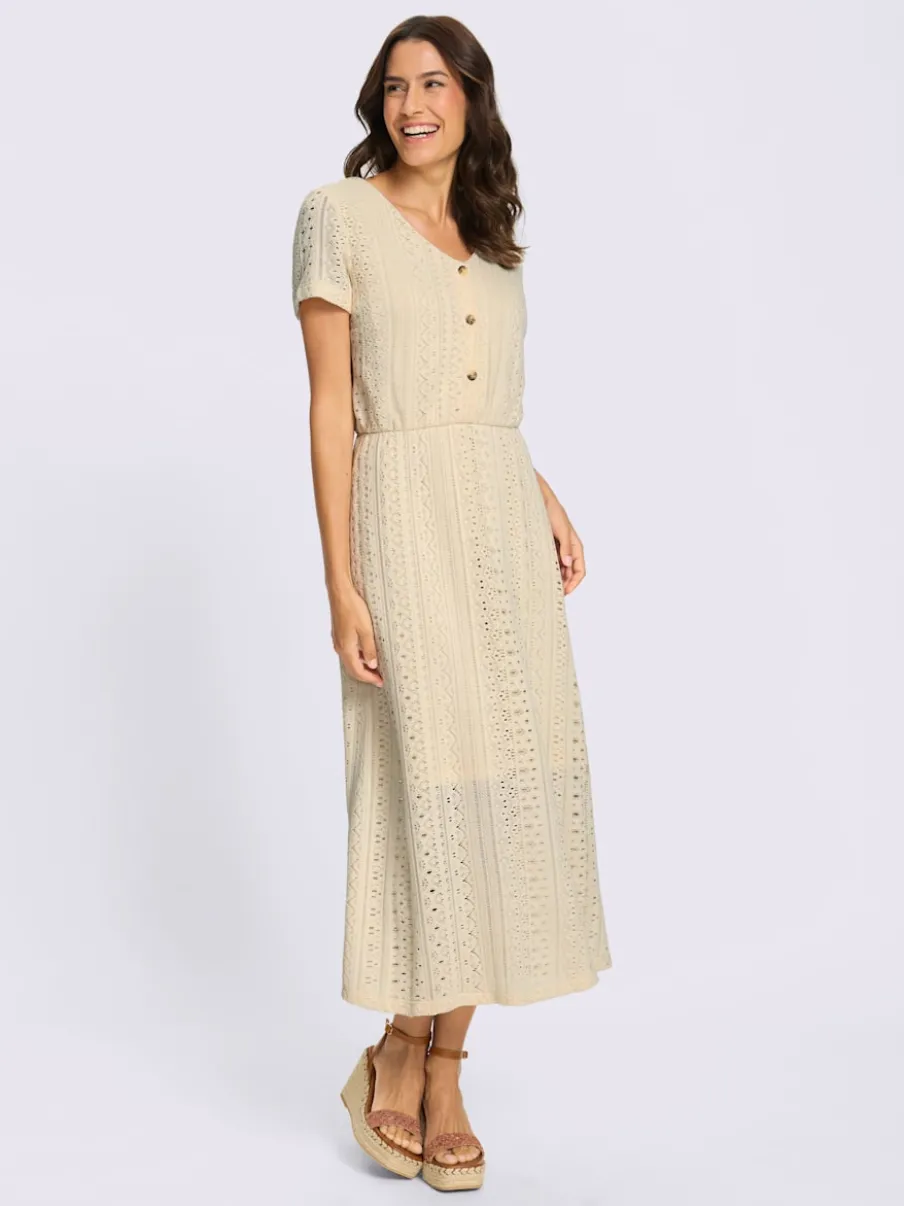 Robe en jersey à col V et manches courtes avec motifs ajourés