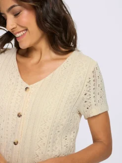 Robe en jersey à col V et manches courtes avec motifs ajourés