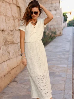 Robe en jersey à col V et manches courtes avec motifs ajourés