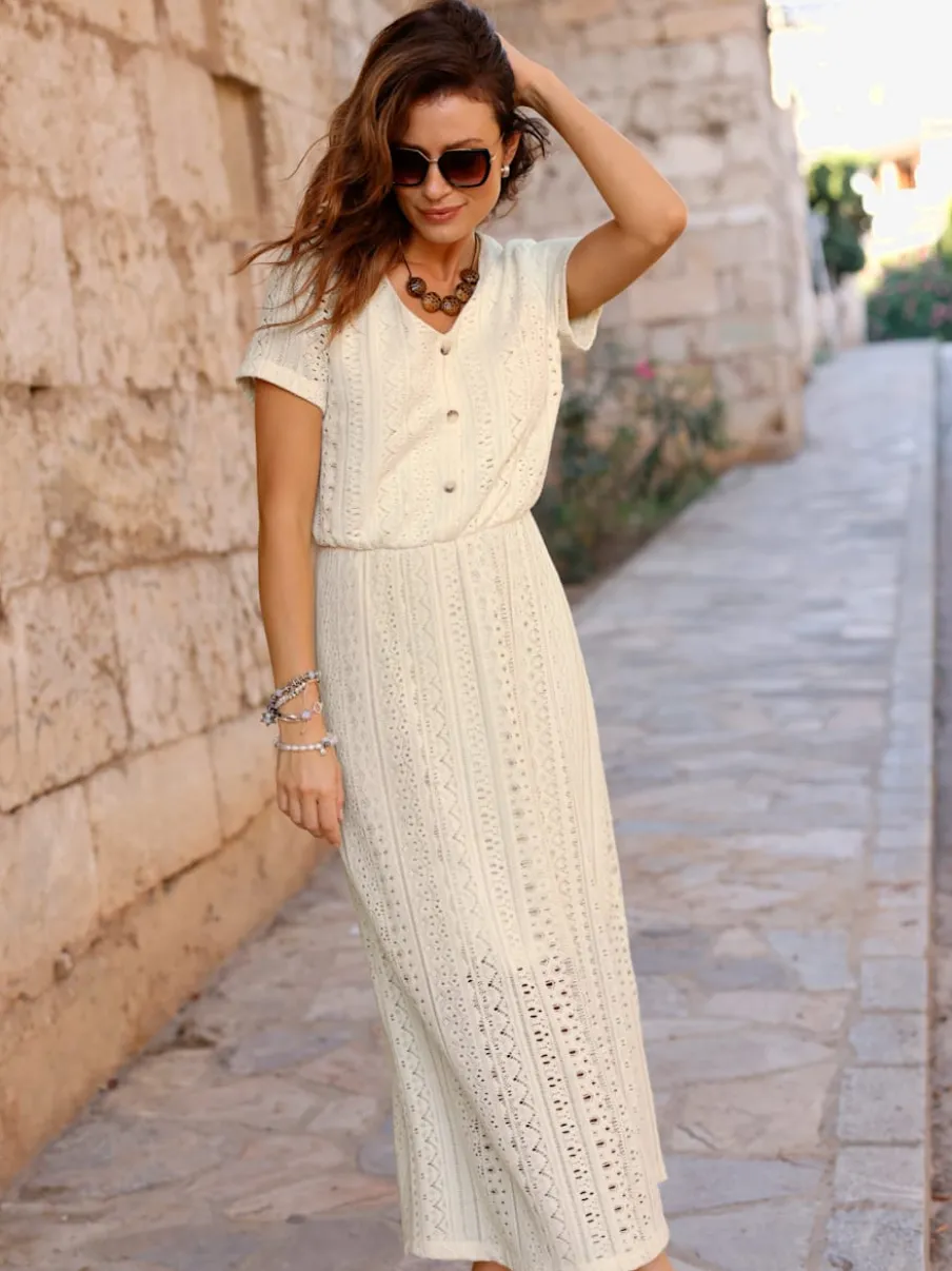 Robe en jersey à col V et manches courtes avec motifs ajourés