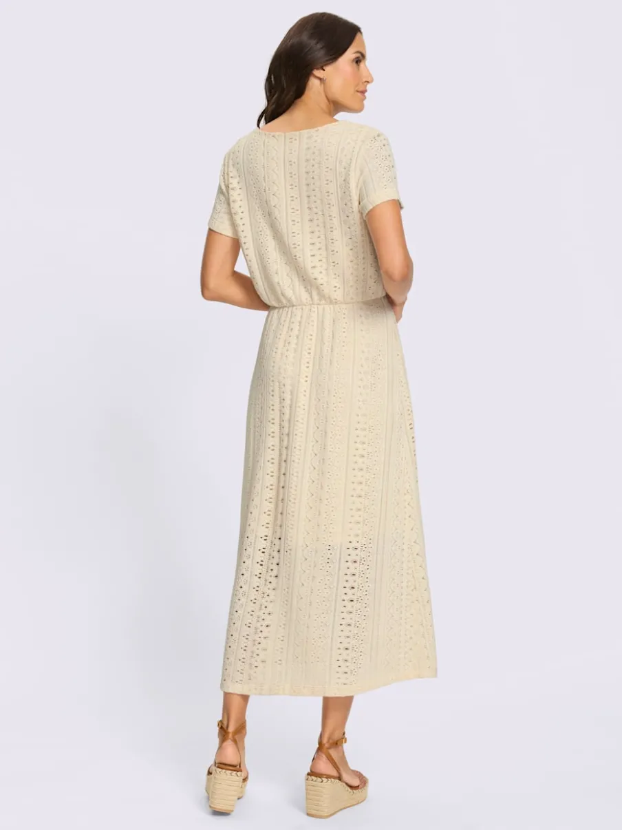 Robe en jersey à col V et manches courtes avec motifs ajourés