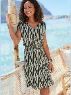 Robe en jersey à encolure en V avec motifs graphiques et empiècement smocké