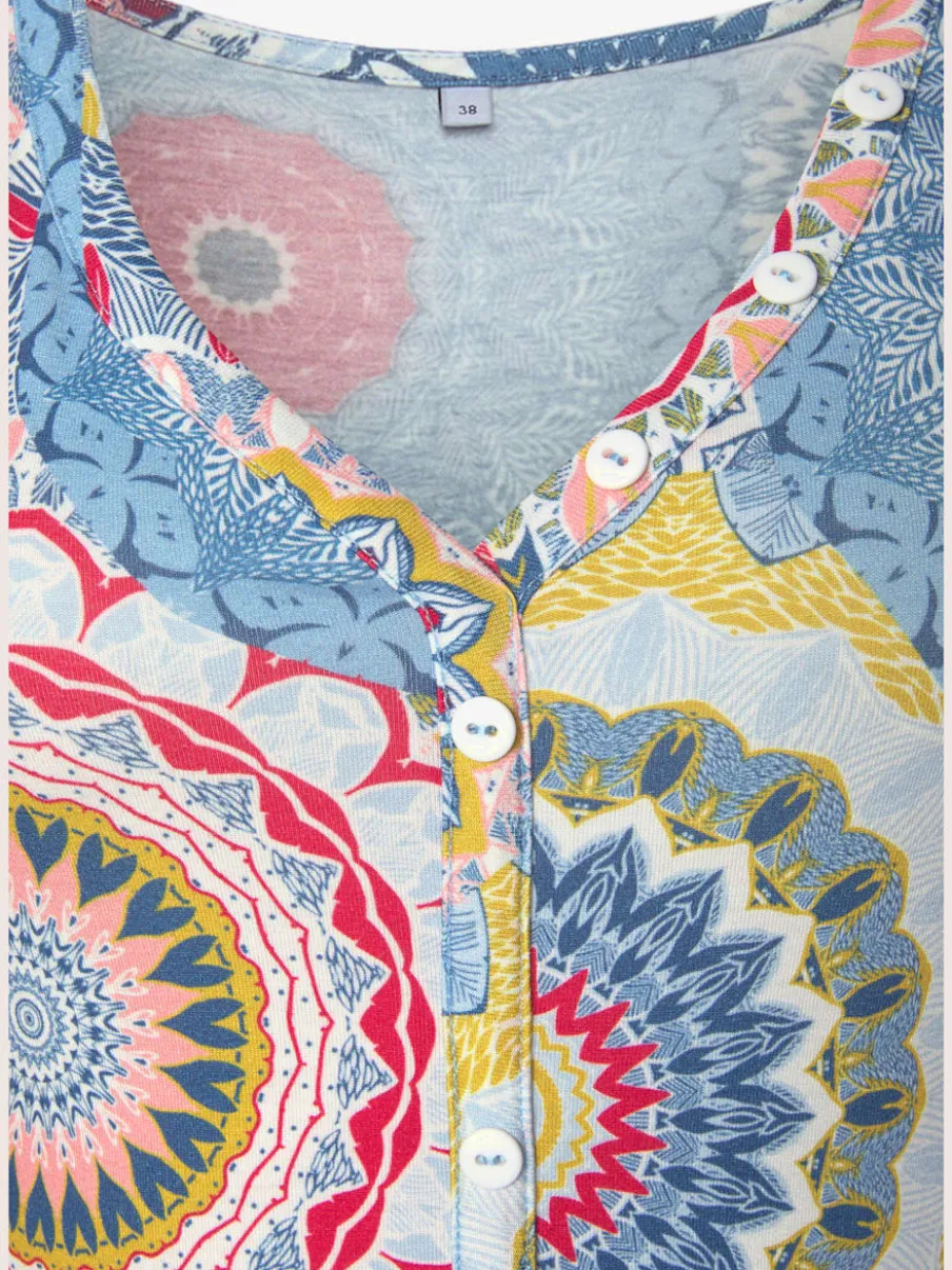 Robe en jersey à encolure en V avec motifs géométriques