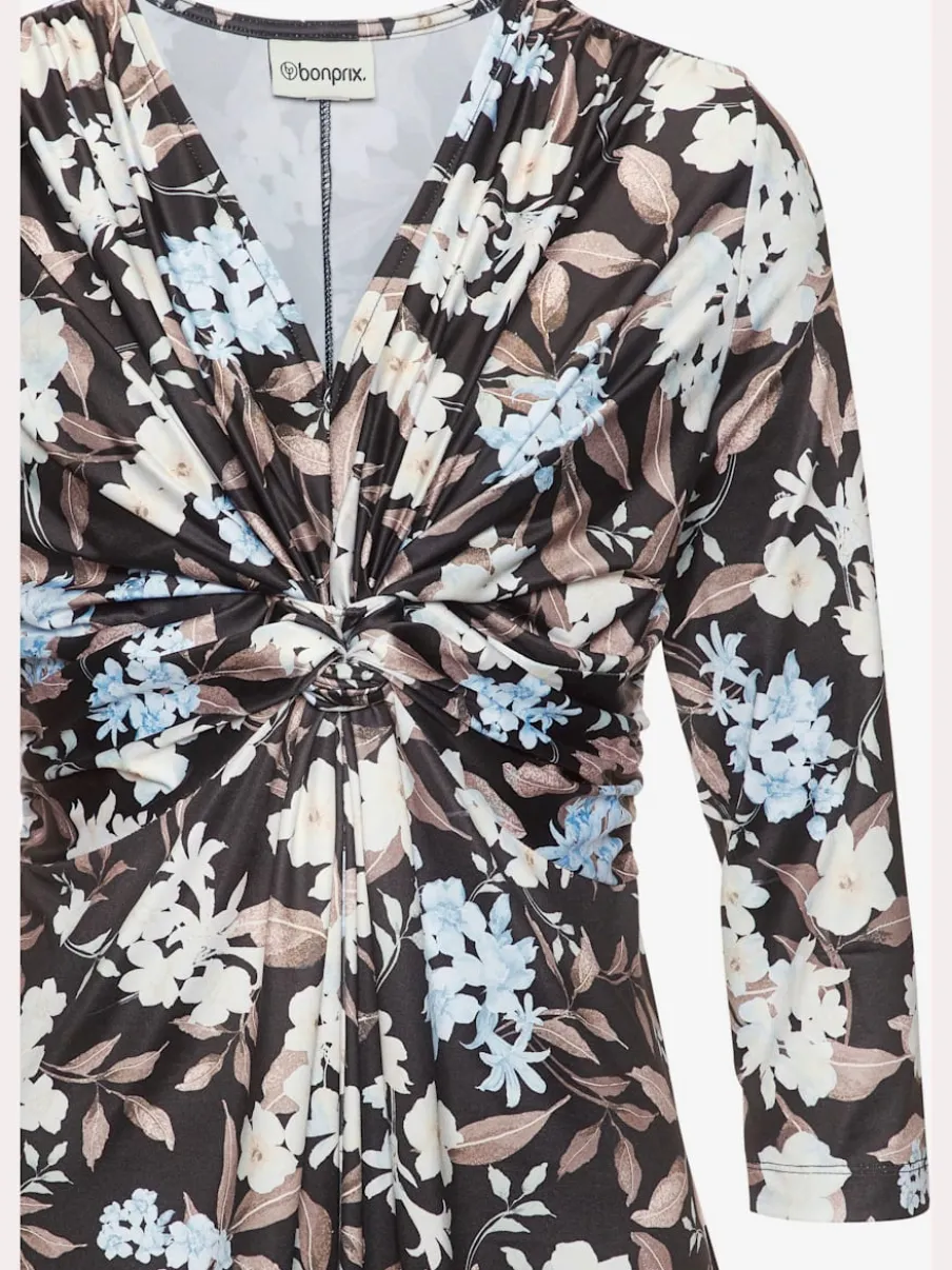 Robe en jersey à encolure en V et manches 3/4 avec nœud devant et motif floral