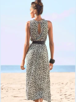 Robe en jersey encolure haute volantée