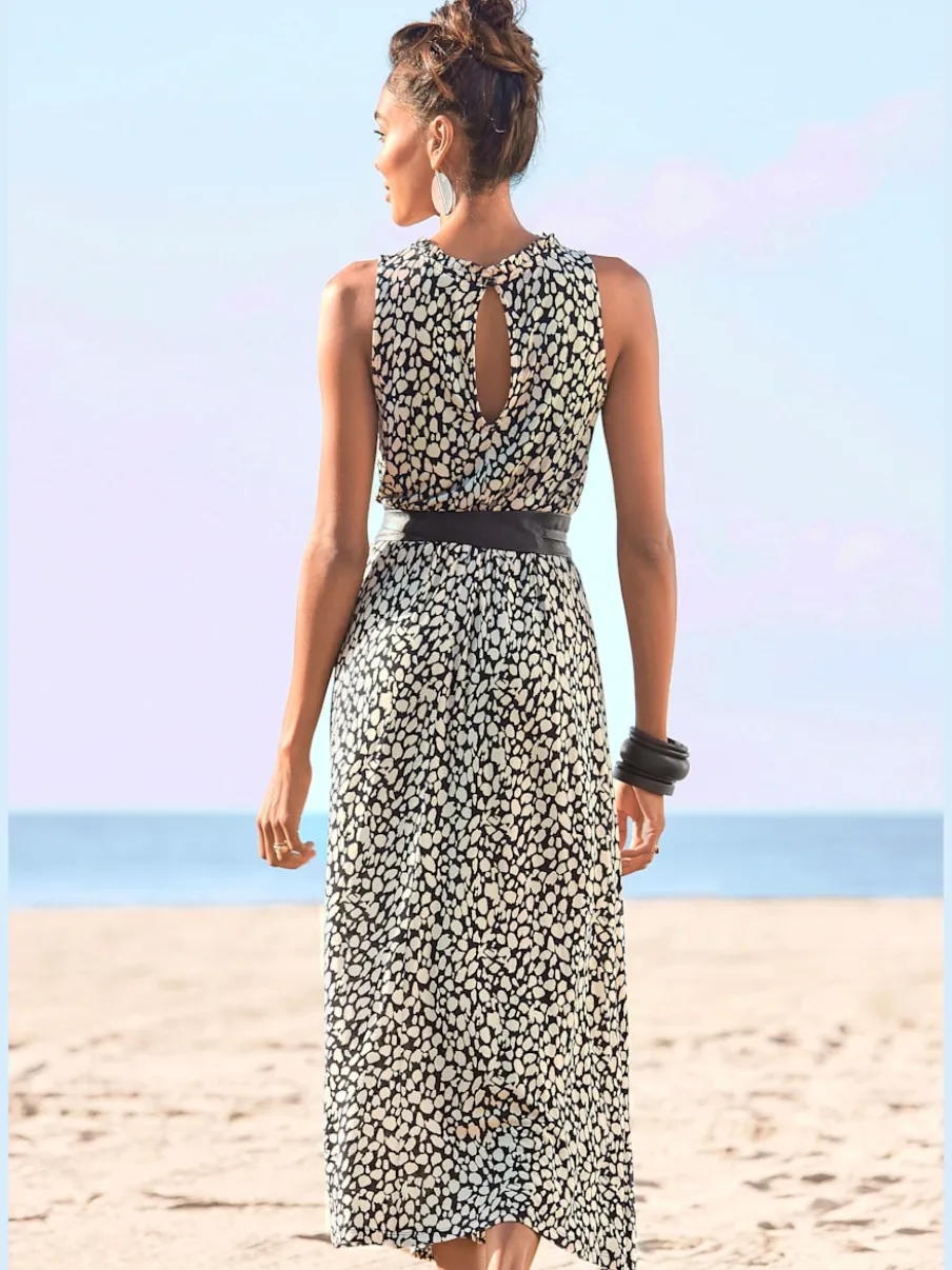 Robe en jersey encolure haute volantée