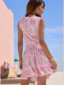 Robe en jersey à encolure ronde avec fronces et jupe volantée