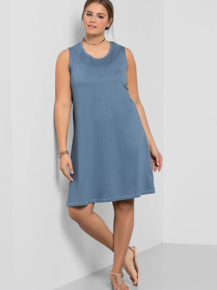Robe en jersey encolure smockée