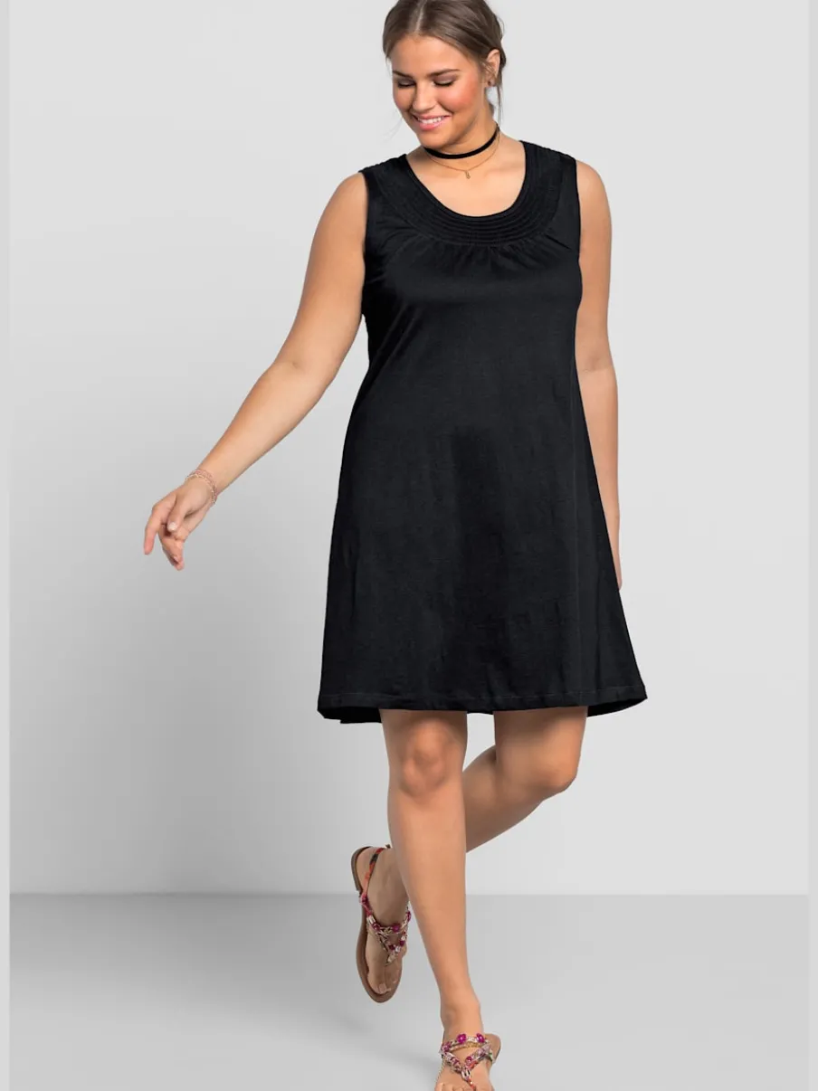Robe en jersey encolure smockée