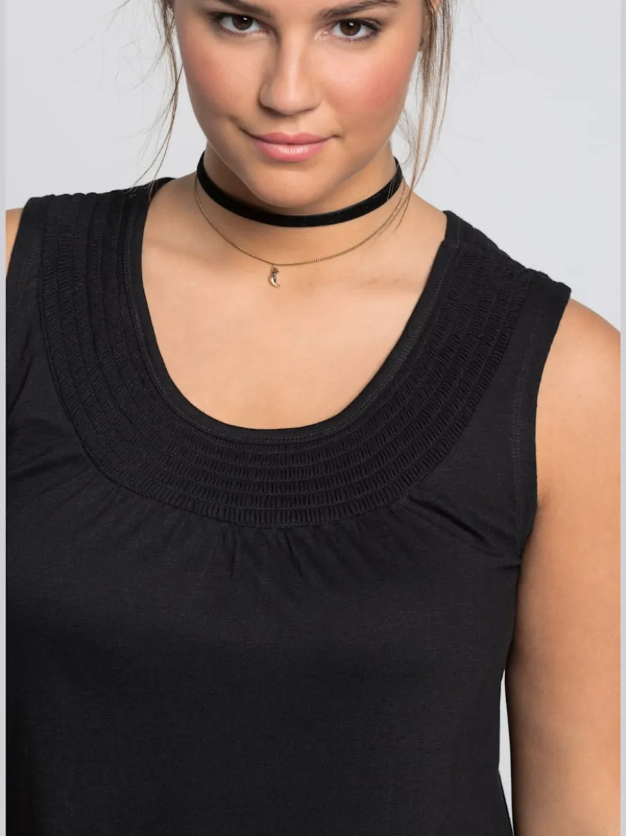 Robe en jersey encolure smockée