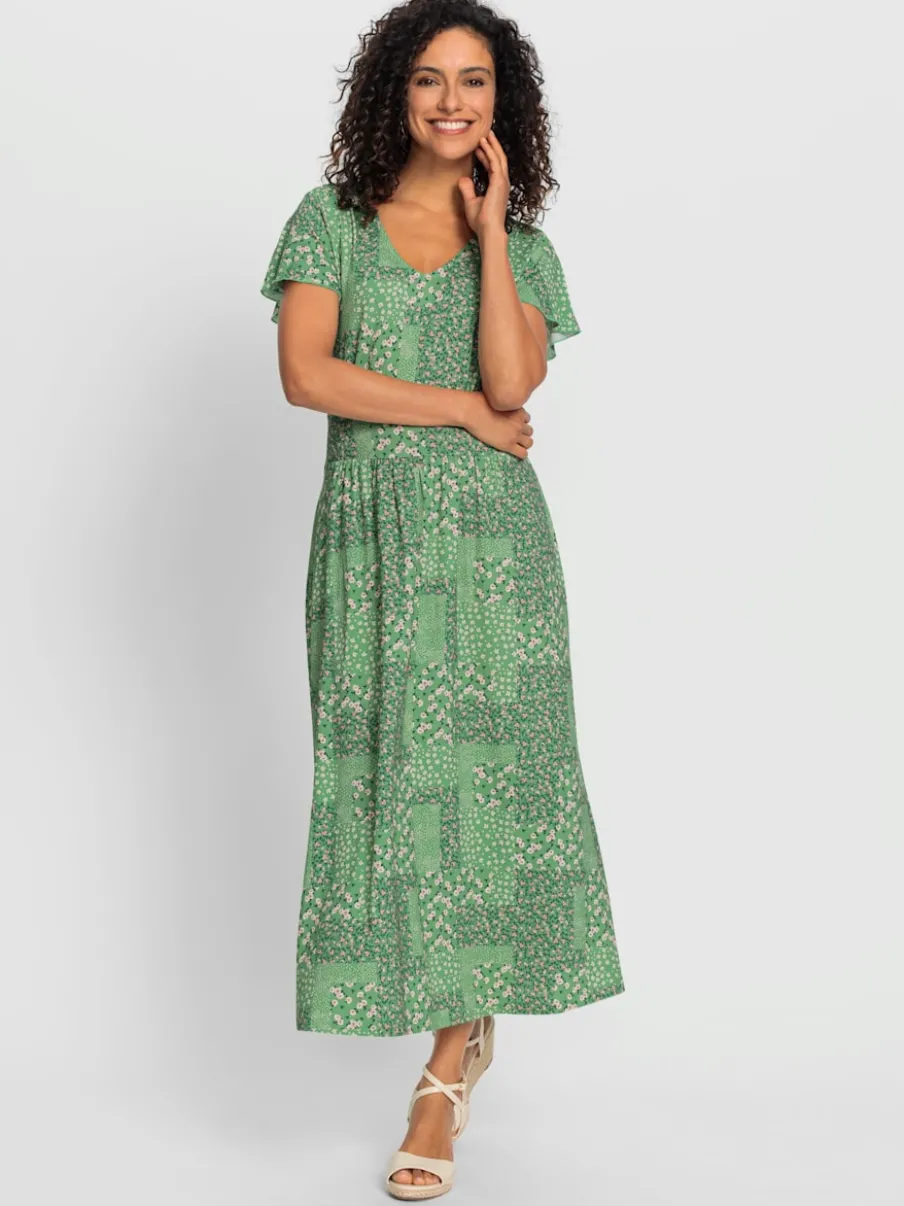 Robe en jersey fluide avec empiècements et manches chauve-souris
