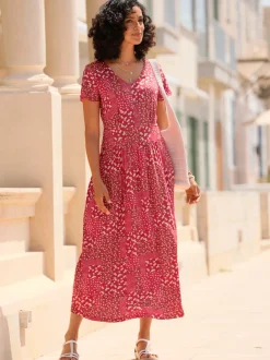 Robe en jersey fluide avec empiècements et manches chauve-souris