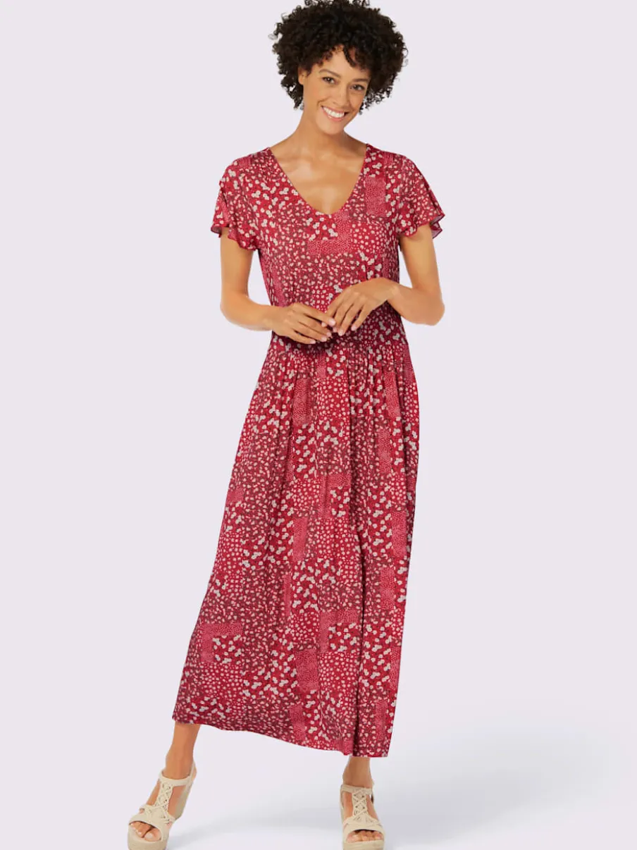 Robe en jersey fluide avec empiècements et manches chauve-souris