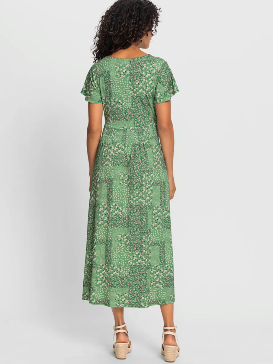 Robe en jersey fluide avec empiècements et manches chauve-souris