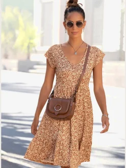 Robe en jersey imprimée avec col en v et volant