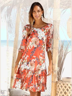 Robe en jersey à manches 3/4 élastiquées avec volant et encolure à rubans