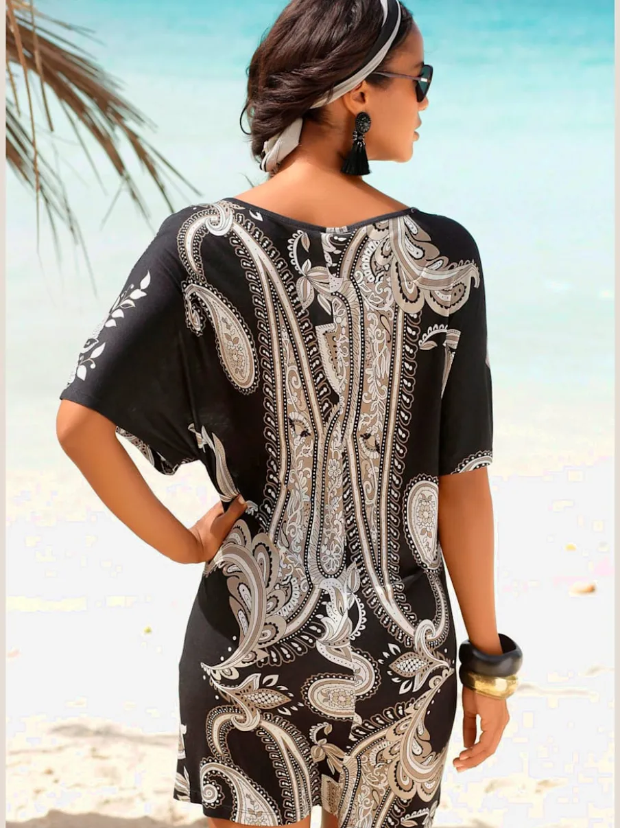 Robe en jersey à motifs floraux et large col arrondi avec manches courtes