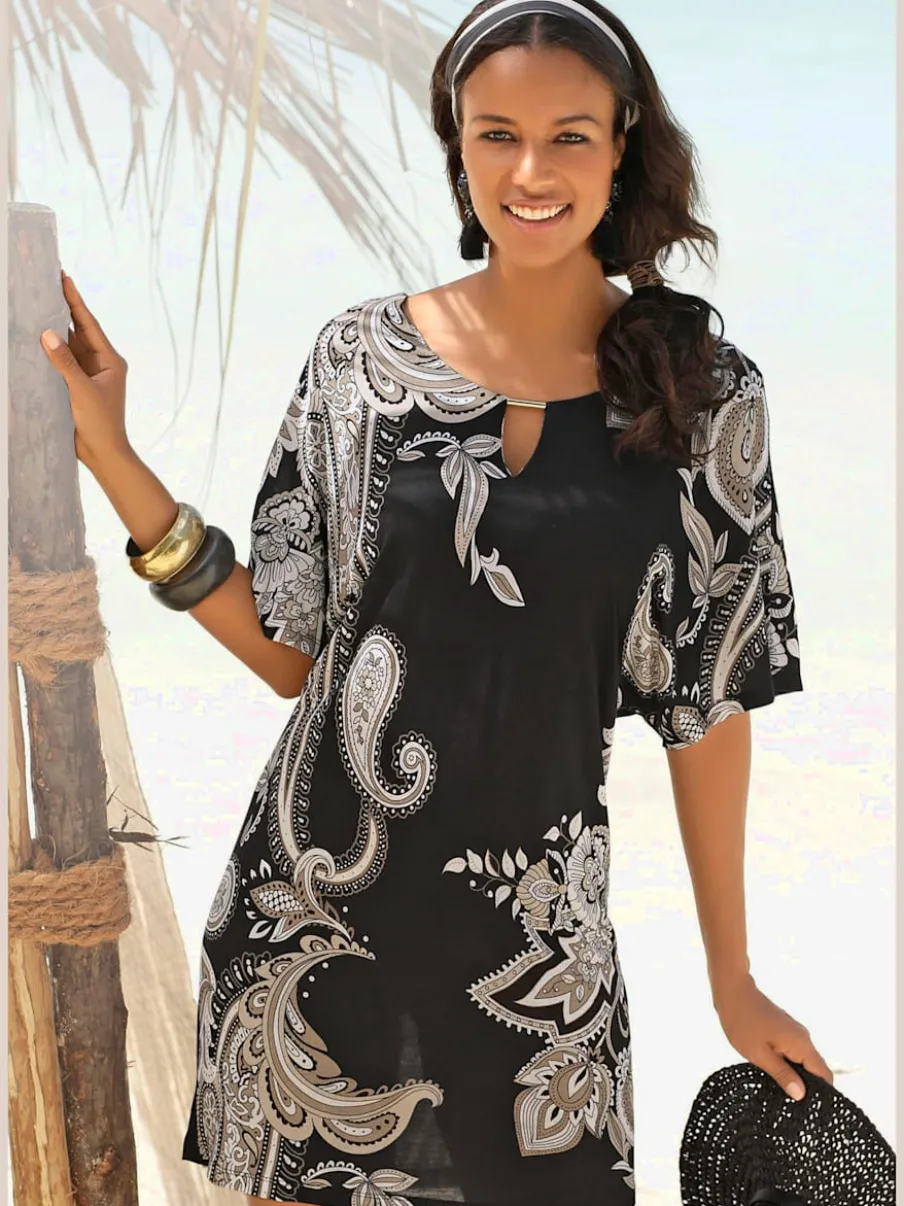 Robe en jersey à motifs floraux et large col arrondi avec manches courtes