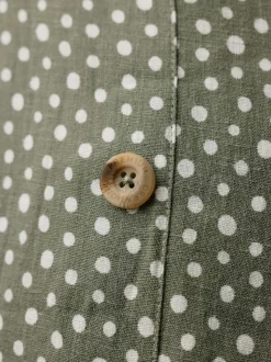 Robe en lin à ceinture boutons et fentes latérales