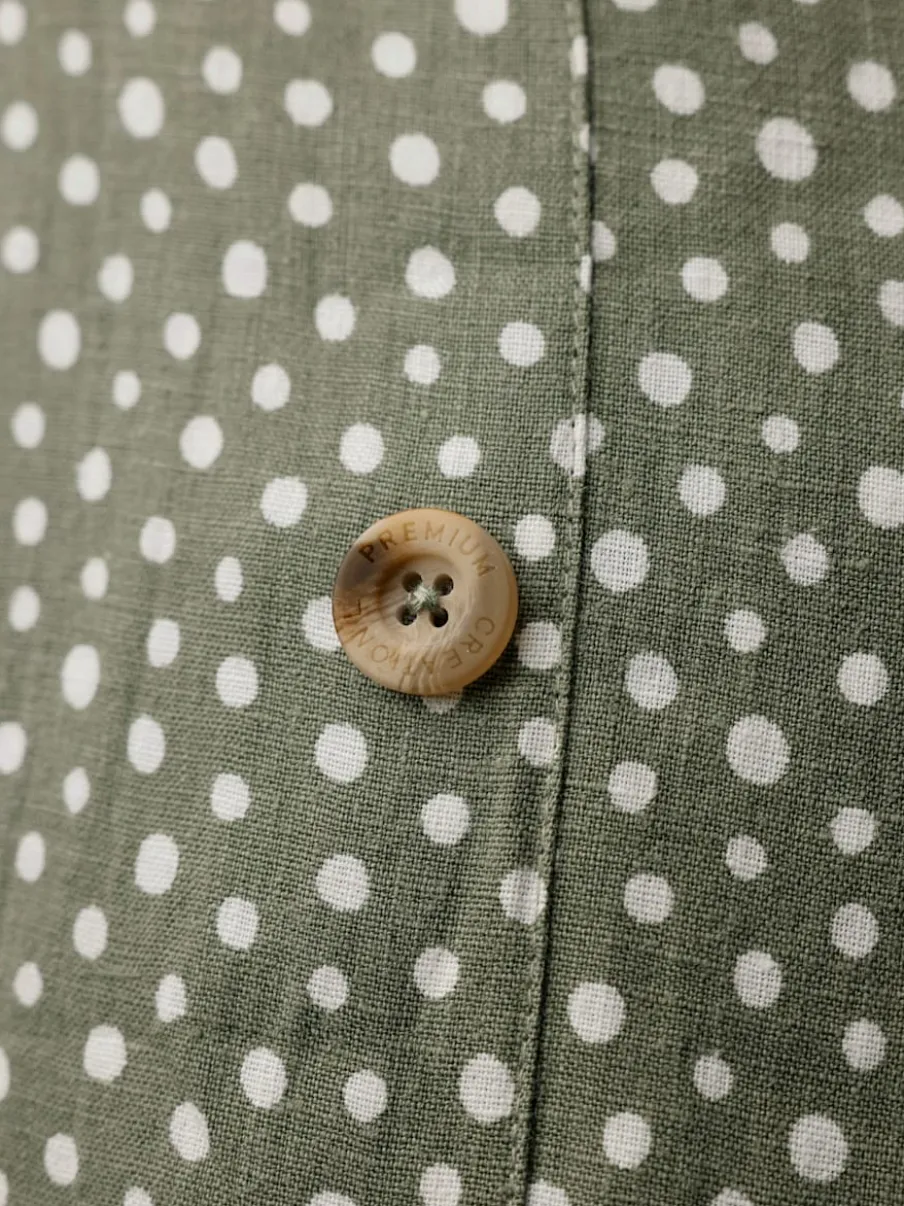 Robe en lin à ceinture boutons et fentes latérales