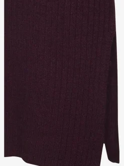Robe en tricot col montant avec manches longues et jupe fendue