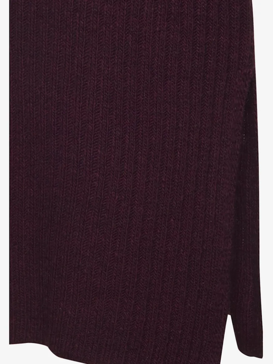 Robe en tricot col montant avec manches longues et jupe fendue